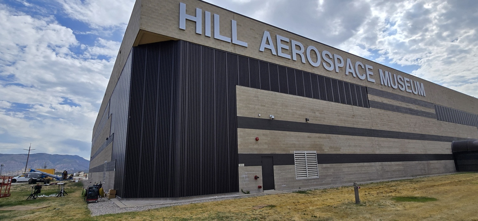 Hill Aerospace Museum exterior with vertical dark metal panels